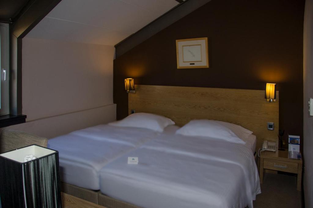City Hotel Подгорица Номер фото